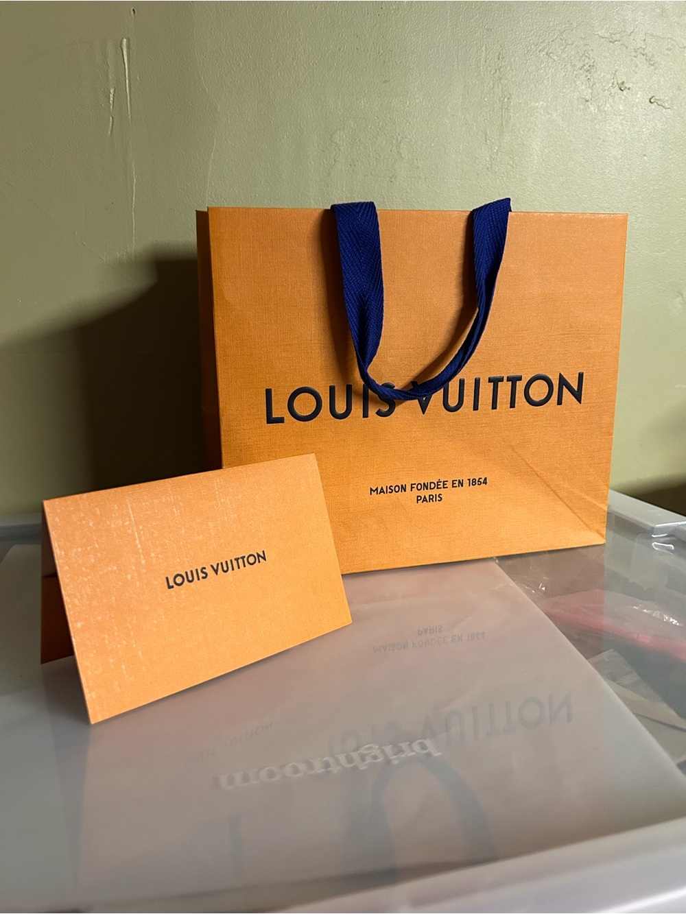 Louis Vuitton Orange Shopping Bag with Blue Ribbon Handles